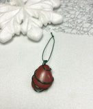 Red jasper tumble Christmas Ornament